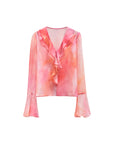 Ruffled loose pink silk blouse front