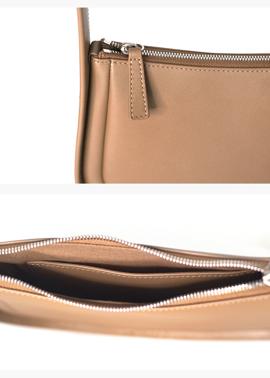 Brown cowhide thin women underarm bag details
